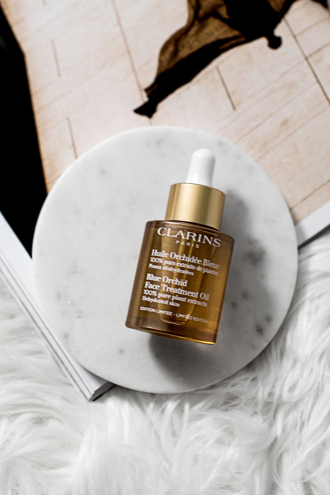 von vogue claire liu clarins blue orchid face treatment oil von vogue claire liu clarins blue orchid face treatment oil