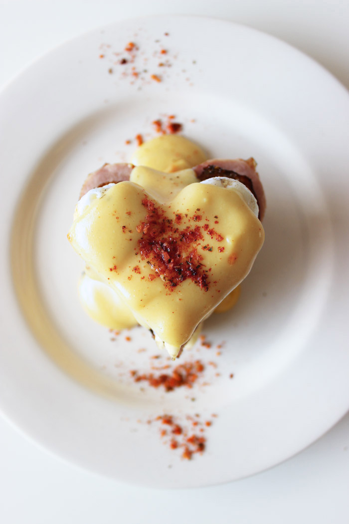 Sriracha + Lime Peppered Eggs Benedict on Bannock