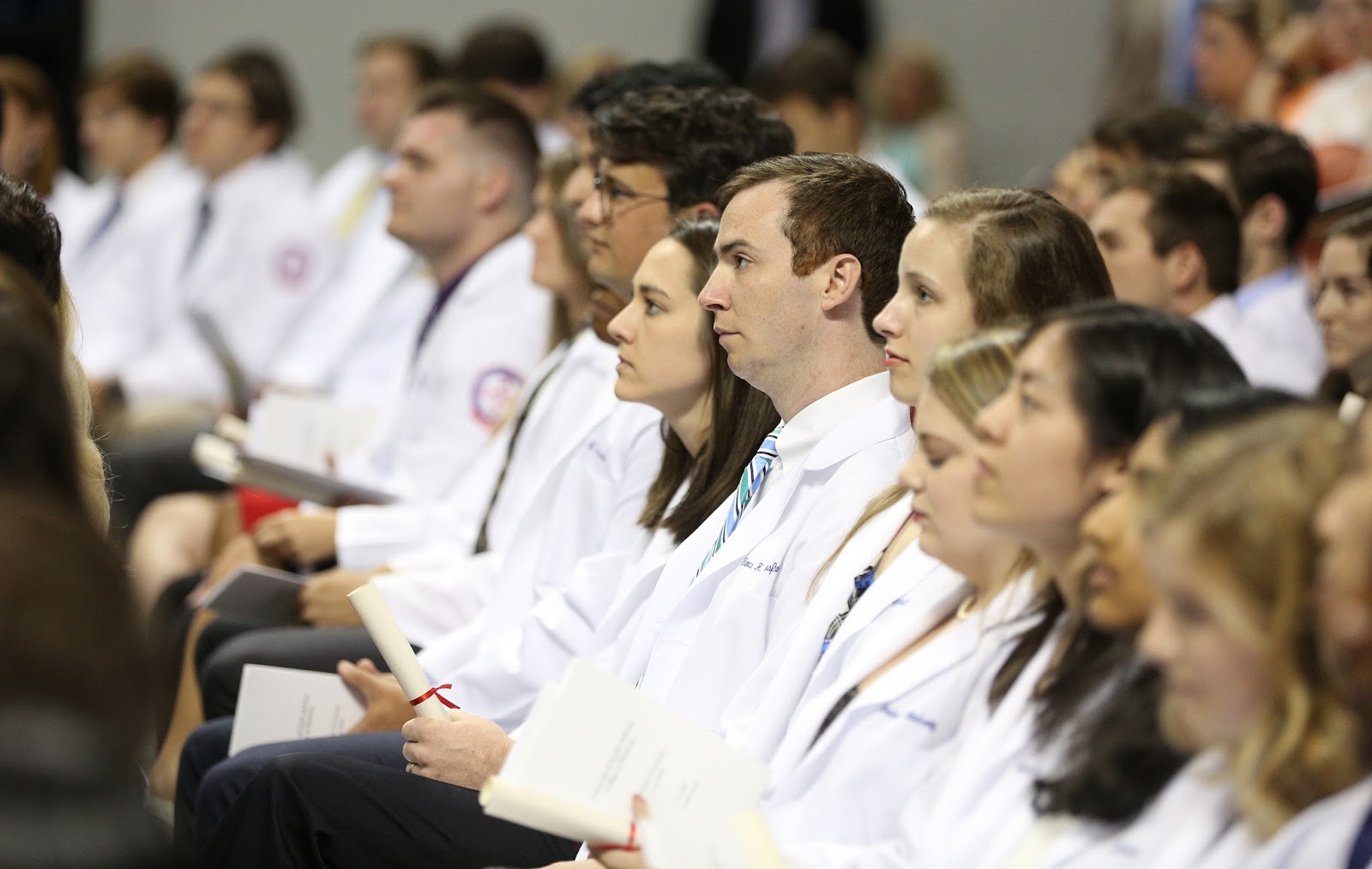 Med School Watercooler Class of 2018 Students Cloaked with White Coats
