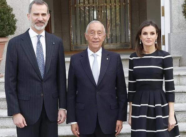 Queen Letizia wore Carolina Herrera striped fit and flare dress. Portuguese president Marcelo Rebelo De Sousa visited Madrid