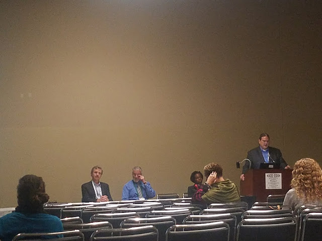 Dr Warne presenting on maternal and child health equity at APHA.