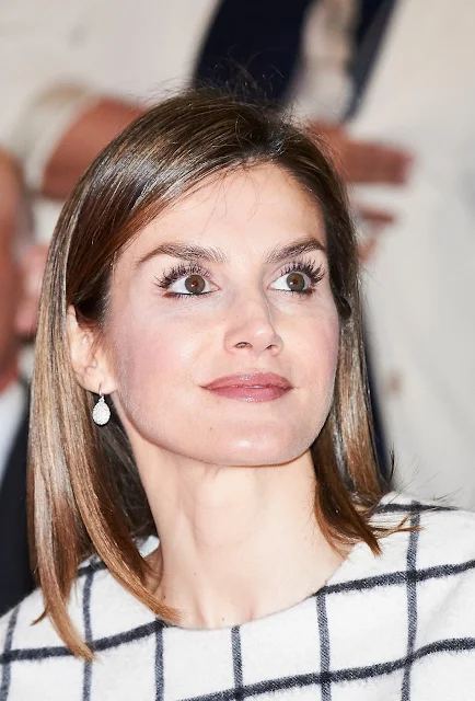 Queen Letizia of Spain attended the Red Cross World Day in Albacete. Queen Letizia wore Designer Remix top, Hugo Boss Trouser, Magrit Pumps