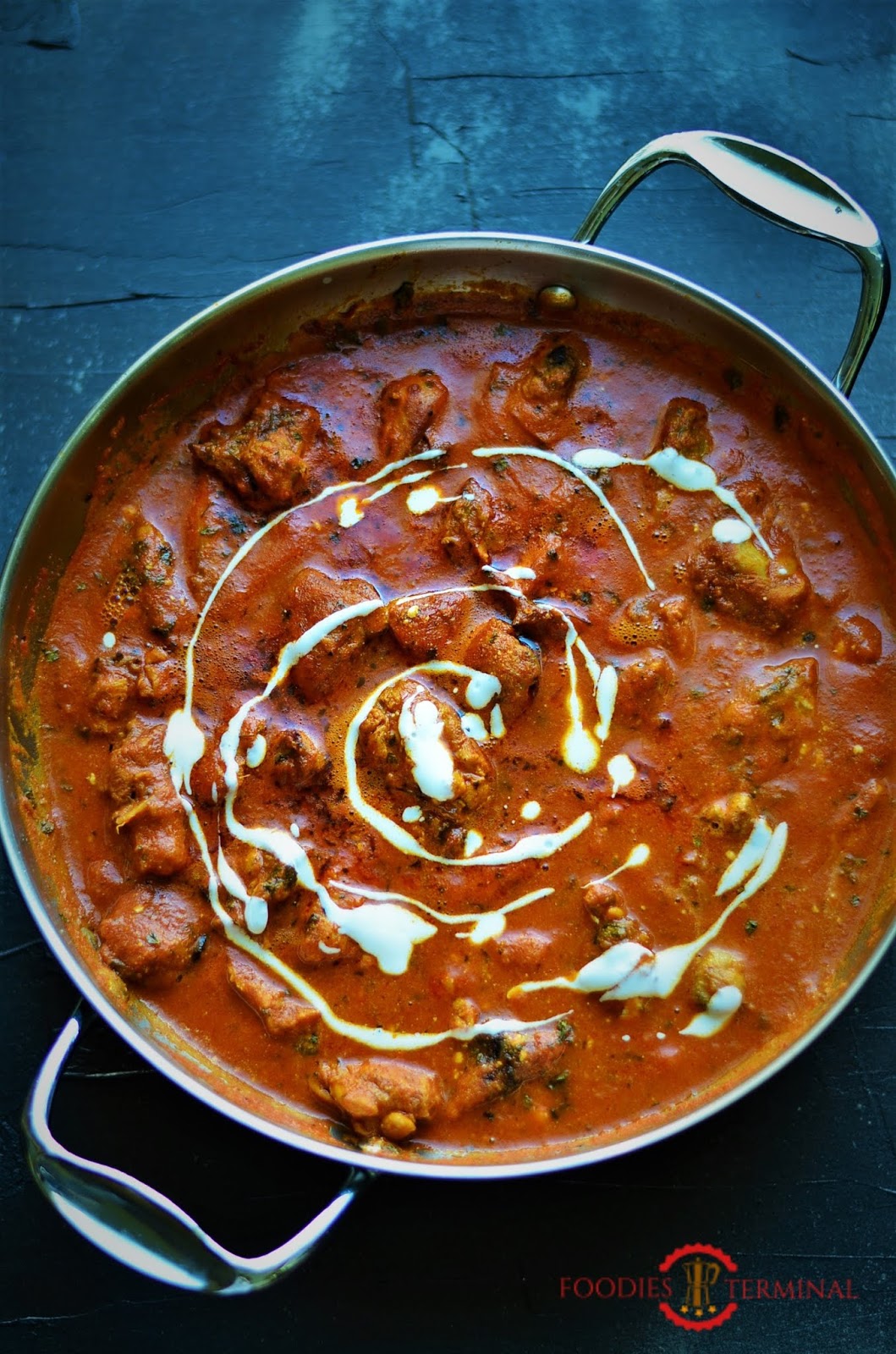 Step By Step Butter Chicken Masala Recipe | Murgh Makhani Restaurant Style. Indian Murgh Makhani gravy garnished with cream.