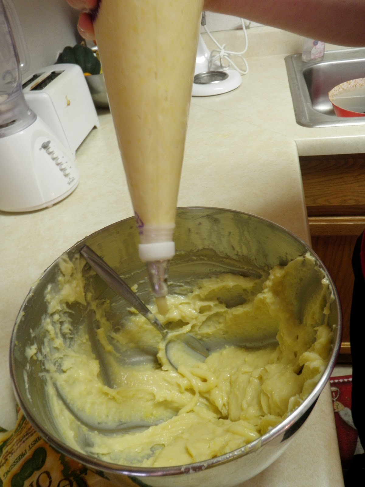 Cake Optimist Lobster Tails and Cream Puffs