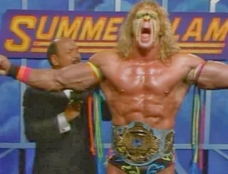 WWF / WWE - SUMMERSLAM 1990: World Wrestling Federation Champion Ultimate Warrior defended the title against Ravishing Rick Rude inside a steel cage