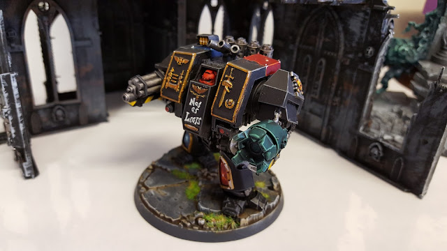 Judge Dreadnought doesn't say much else... space marine dreadnought field police