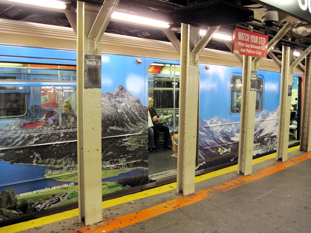 Get lost in a trip to Switzerland aboard these New in New York billboards on the subway