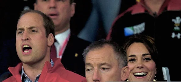 Catherine, Duchess of Cambridge and Prince William and Prince Harry attends a Pool A match of the 2015 Rugby World Cup