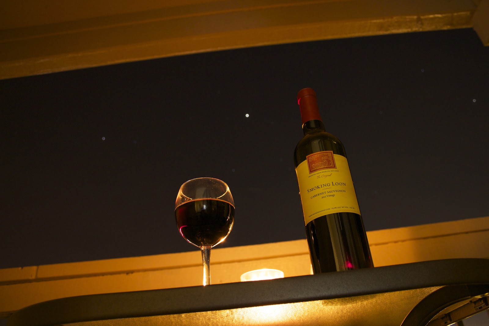 night wine glass and bottle with stars