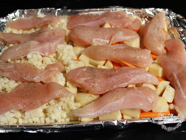 Parmesan Chicken Sheet Pan Dinner: Tender, juicy chicken tenderloins baked to perfection with your favorite vegetables smothered in a Parmesan cheese sauce. All cooked on a single pan! EASY CLEAN UP!