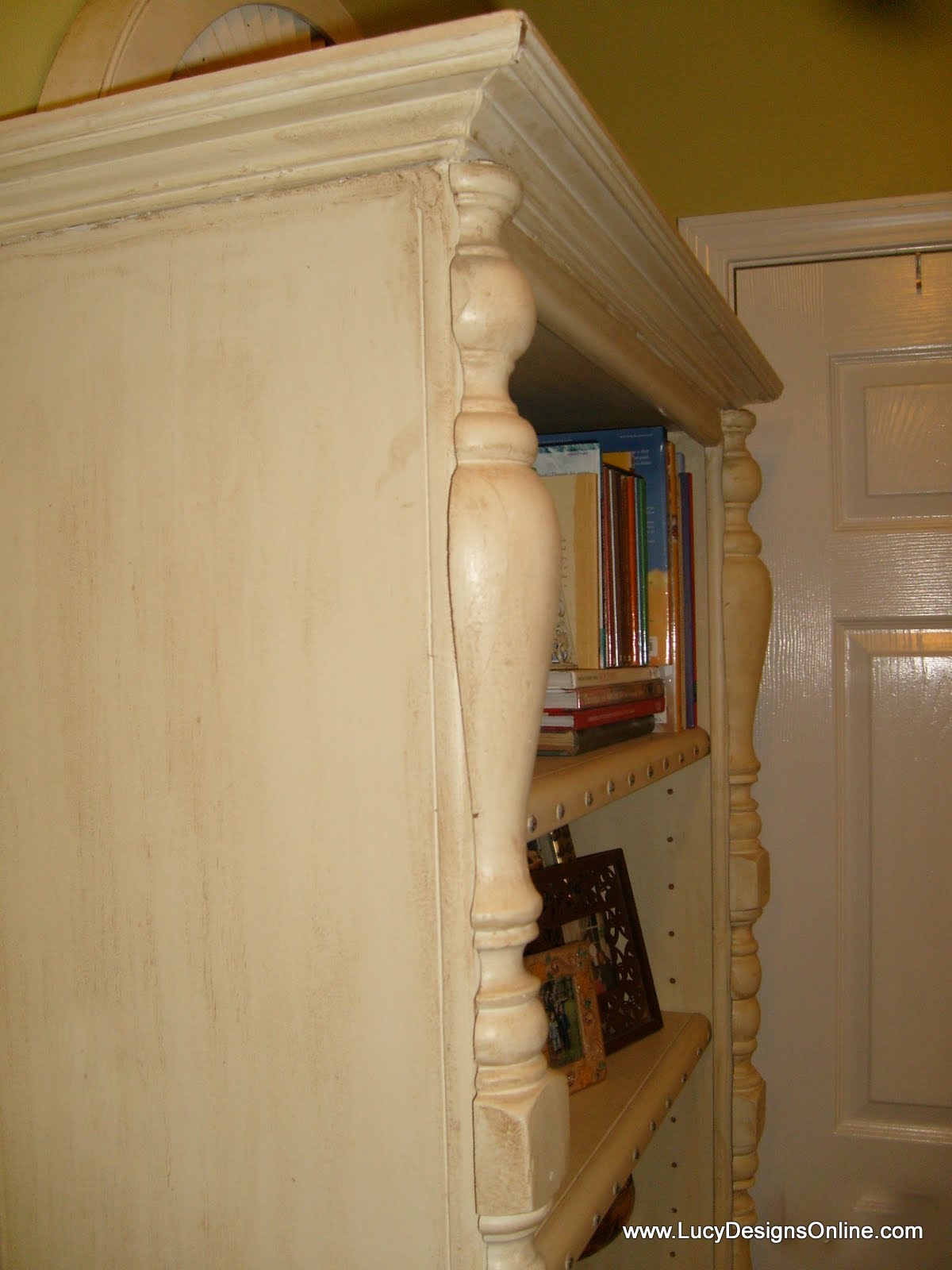 DIY Bookshelf Makeover using Recycled Spindles, Table Legs, Molding and Studs Lucy Designs