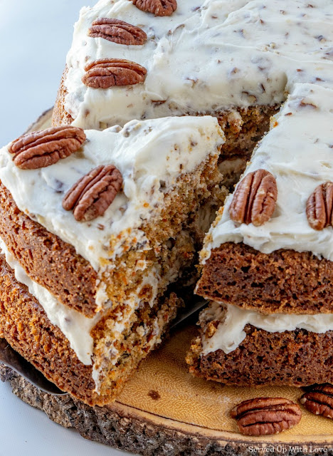 Carrot Cake recipe with creamy cheese icing and pecans from Served Up With Love