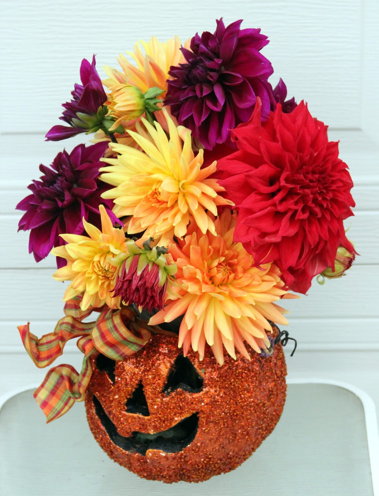 HALLOWEEN ARRANGEMENTS USING DECORATIONS FOR VASES Sowing the Seeds