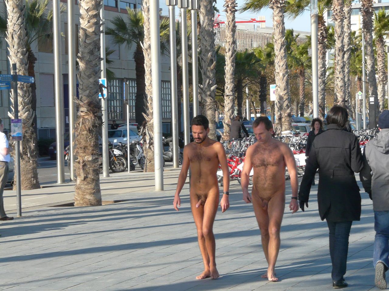 Nude beneath the palm-lined streets of Barcelona.