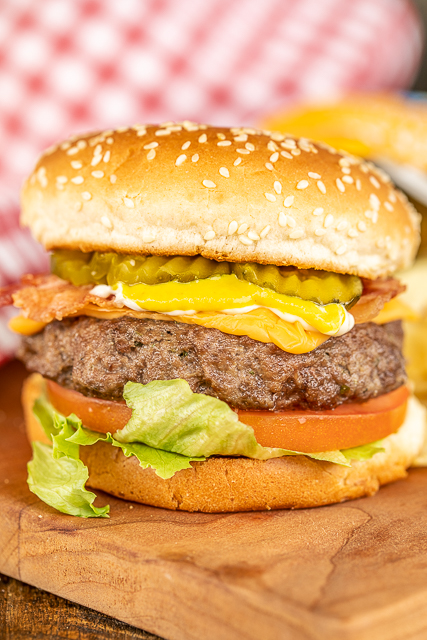 The BEST Air Fryer Burgers - hands down the BEST burgers EVER! Ready from start to finish in under 10 minutes. Clean up is a breeze with the air fryer!! Can make the patties ahead of time and refrigerated or frozen for later. We never grill burgers anymore. They are SO much better in the air fryer! Top burgers with your favorite burger toppings - lettuce, tomatoes, cheese, bacon. #airfryer #burger #hamburgers hamburger on a bun