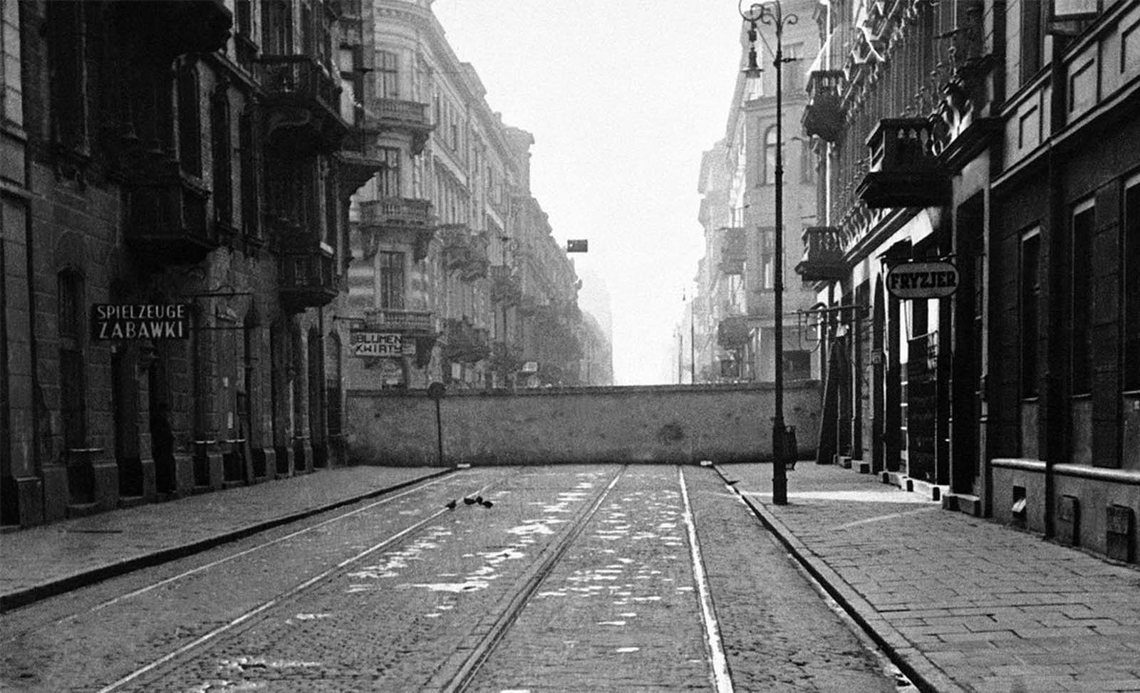 A newly-constructed wall partitions the central part of Warsaw, Poland, seen on December 20, 1940. It is part of red brick and gray stone walls built 12 to 15 feet high by the Nazis as a ghetto - a pen for Warsaw's approximately 500,000 Jews.