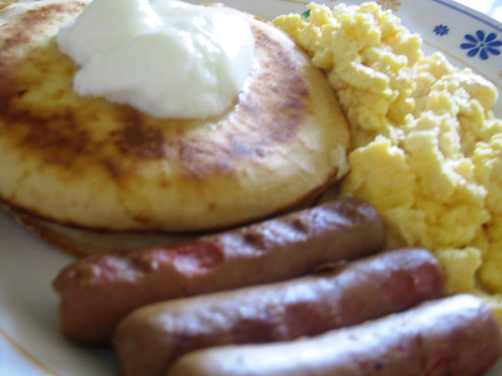 At Our Kitchen Pancakes with Scramble Eggs and Sausage