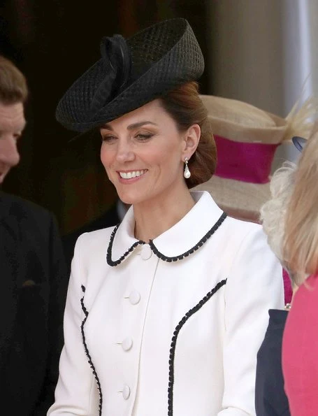 The Duchess is wearing Catherine Walker. Queen Maxima is wearing Claes Iversen. Queen Letizia wore a printed midi dress by Cherubina