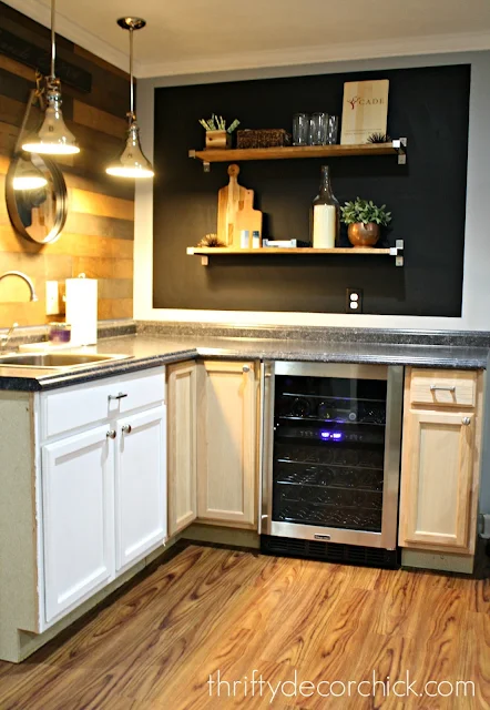 Kitchenette with wood and chalkboard walls