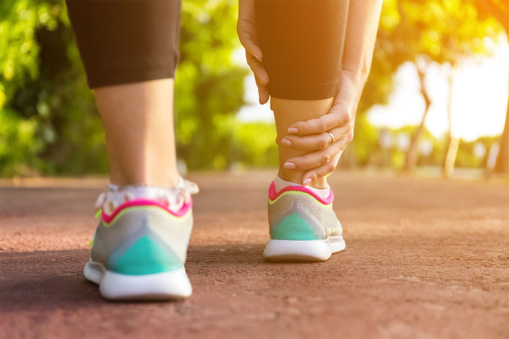 total ankle replacement woman holding ankle