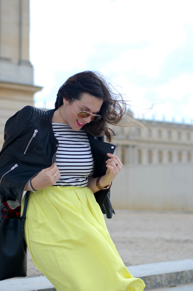 An outfit post featuring a 424 Fifth citron midi skirt, a stripe Forever 21 shirt and a Mansur Gavriel bucket bag shot at the Palace of Versailles by Vancouver fashion blogger Aleesha Harris of Covet and Acquire.