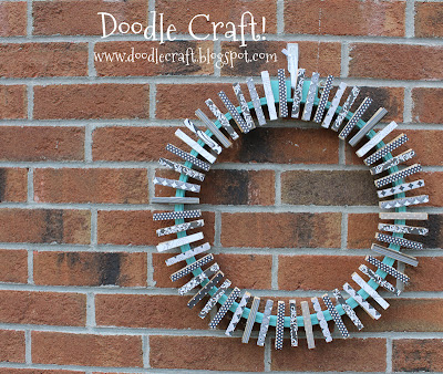 http://www.doodlecraftblog.com/2012/06/upcycled-embroidery-hoop-and-clothespin.html