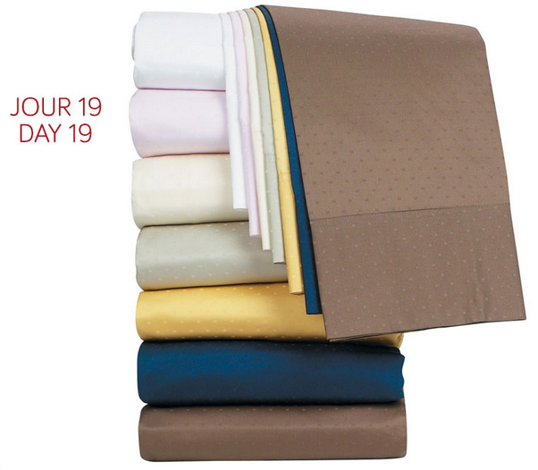 Les Coupons Rabais Un ensemble de draps de la collection Swiss Dot à