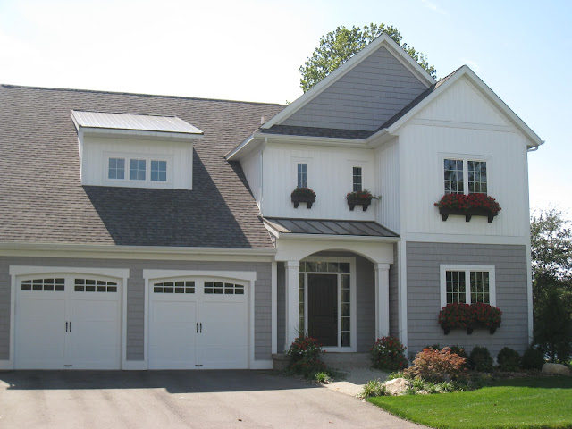 A white and gray cottage