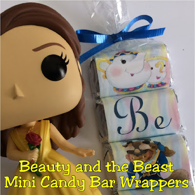 Looking for a sweet party favor for your Beauty and the Beast party? These mini candy bar wrappers are beautiful and super easy to create a great party treat, favor, or invitation when you go see the new Beauty and the Beast movie or celebrate at your Beauty and the Beast birthday party.