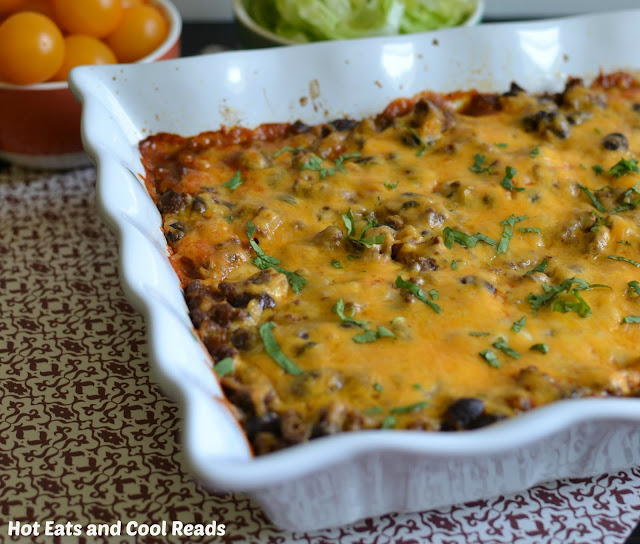 A delicious family friendly and budget friendly Mexican meal! Great for weeknights and leftover for lunch! Beefy Black Bean Enchilada Bake Recipe from Hot Eats and Cool Reads
