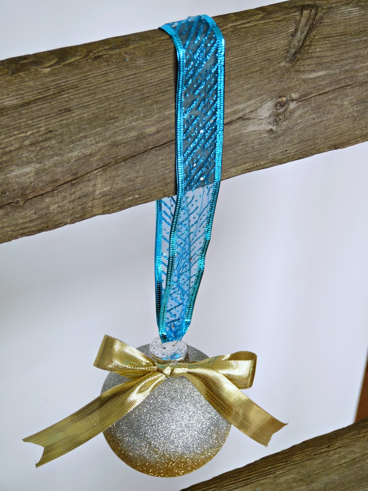 Hand ornaments on a rustic ladder Hand ornaments on a rustic ladder