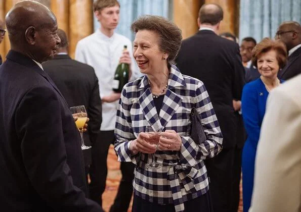 Kate Middleton wore a new red sequined tulle gown by Needle and Thread. The Countess of Wessex wore a stripe knit dress by Alaïa