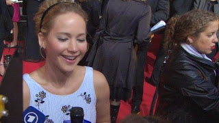 We’re confused, cause we though Jennifer Lawrence was playing the famous nun turned governess in a TV version of the Sound of Music. And yet this dress suggests she’s playing the famous princess from Cinderella as the actress raised the fashion stakes at the Hunger Games premiere in London on Monday, November 10, 2014.