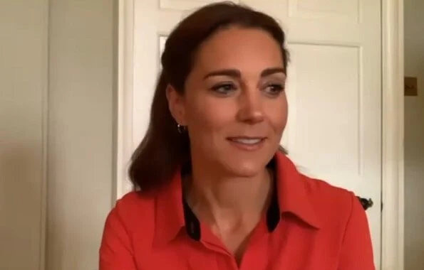 The Duchess wore a vibrant red shirt. Kate Middleton accessorised with her Daniella Draper earrings. The hopps is part of the shamrock earrings