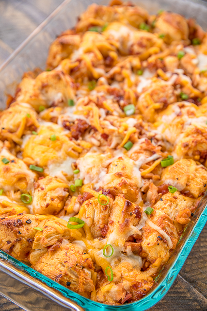 BBQ Chicken Bubble Up Pizza Recipe - Biscuit Pizza Casserole Recipe - Bubble Up Pizza - only 5 ingredients and ready in under 30 minutes! Refrigerated biscuits tossed in BBQ sauce chicken, bacon,topped with mozzarella and cheddar. We LOVE this casserole! We make this at least twice a month!! #pizza #casserole #chickenrecipe BBQ Chicken Bubble Up Pizza Recipe - Biscuit Pizza Casserole Recipe - Bubble Up Pizza - only 5 ingredients and ready in under 30 minutes! Refrigerated biscuits tossed in BBQ sauce chicken, bacon,topped with mozzarella and cheddar. We LOVE this casserole! We make this at least twice a month!! #pizza #casserole #chickenrecipe