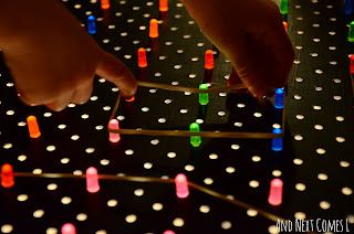 Making shapes on a light bright geoboard for fine motor fun from And Next Comes L