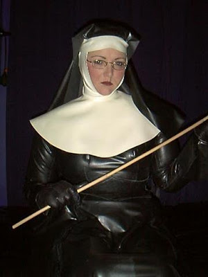 nun in rubber, holding cane, rubber gloves, habit, fetish, glasses