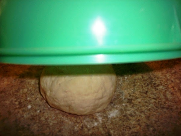 Place the dough under a bowl