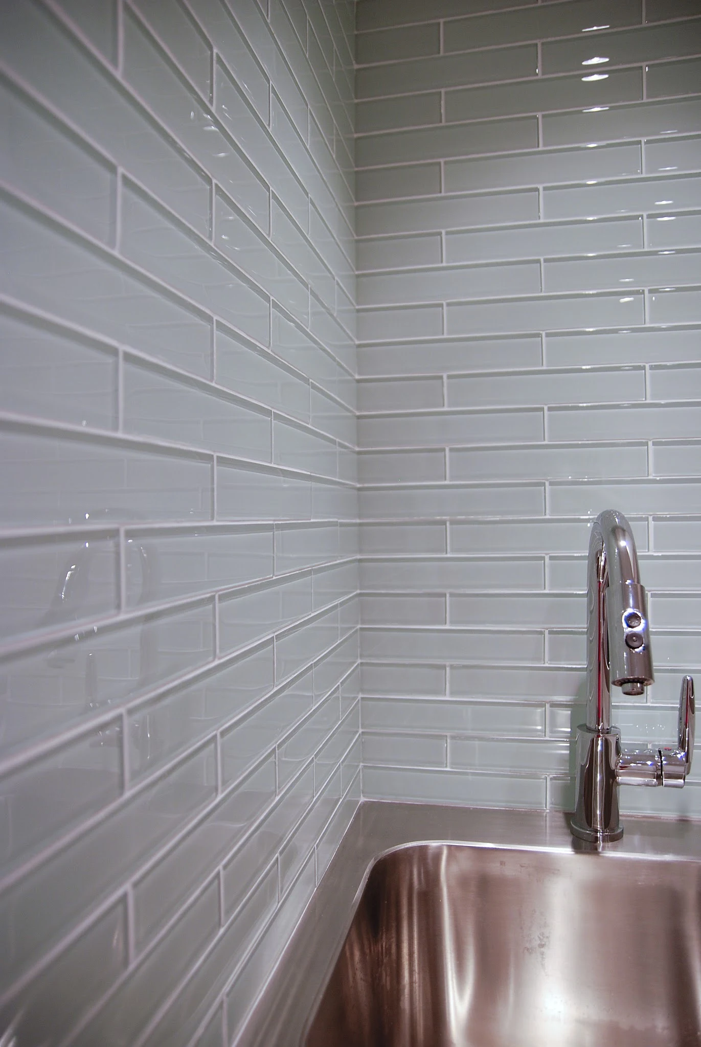 glass tile backsplash, glass tile in laundry room, laundry room backsplash, glass tile installation