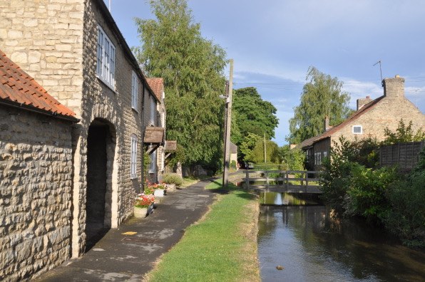 Morgan's Milieu | Home Exchange Membership Giveaway: Photo of a house beside the canal