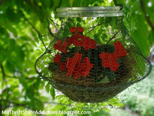 Repurposed vintage egg basket planter