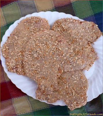 Pretzel Crusted Pork Chops with Apricot Cream Sauce, pan fried pretzel coated pork chops served drizzled with an apricot cream sauce | Recipe developed by www.BakingInATornado.com | #recipe #dinner