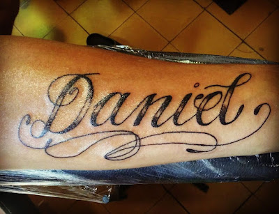Nombre tattoo