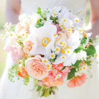Feverfew, peonies, and roses Spring wedding bouquet