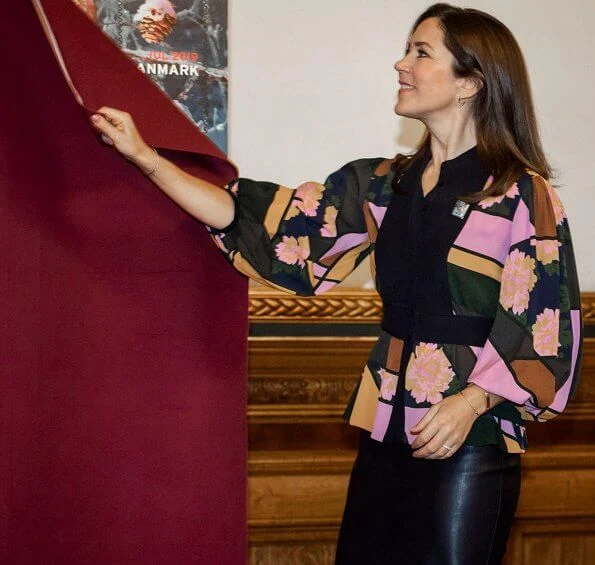 Crown-Princess Mary wore Massimo Dutti coat,and Roksanda Jaco paneled jacquard blouse. Mads Z Jewellery gold ring and earrings