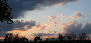 The clouds threatened, as the sun went down The clouds threatened, as the sun went down