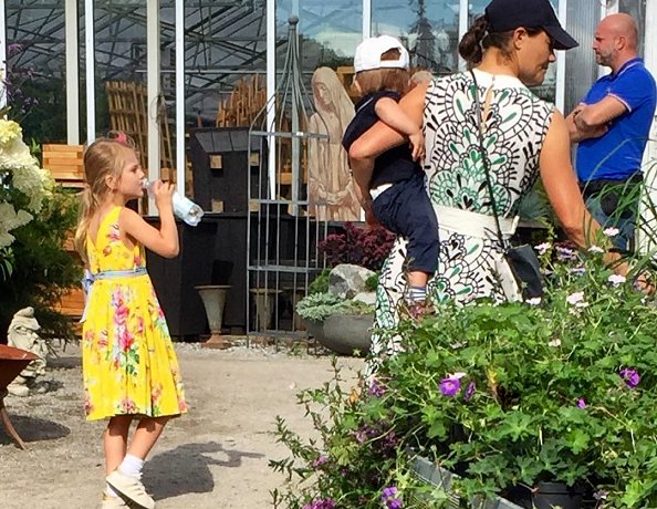 Crown Princess Victoria, Princess Estelle and Prince Oscar were seen Ulriksdal Palace Garden in Solna. Vore print dress