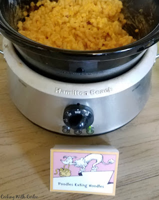 slow cooker filled with mac and cheese