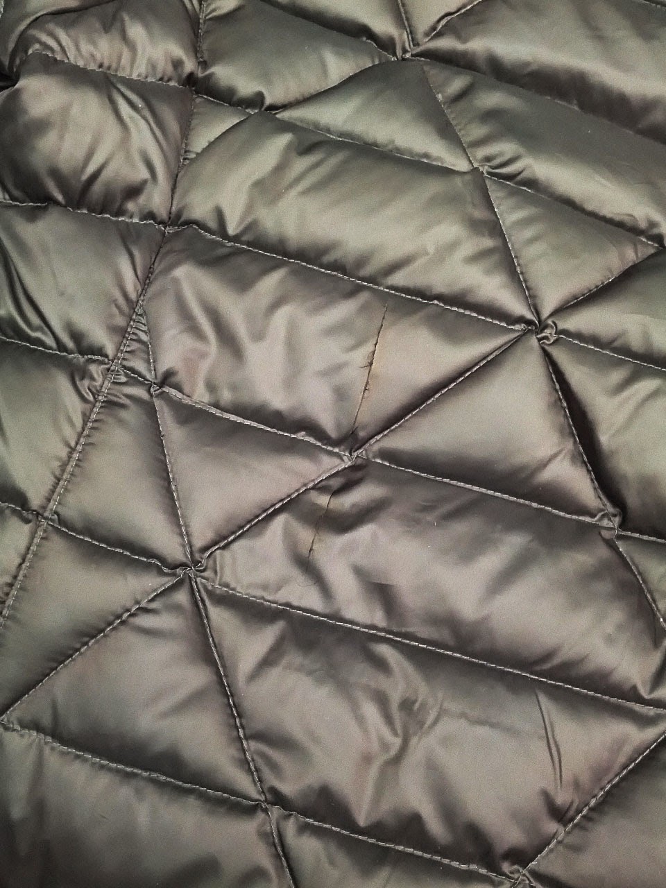 Cindy and the Balsam Tailors Creative Repair On A Down Puffer Jacket