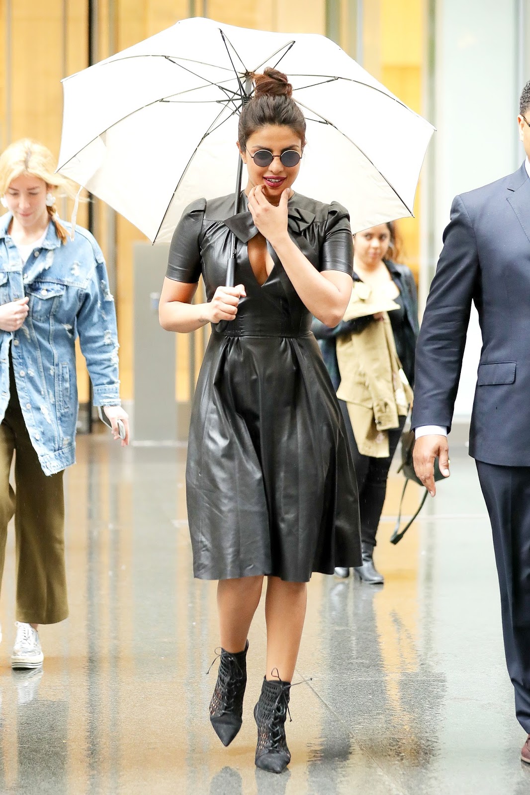 Priyanka Chopra Displayed Her Sexy Cleavage in a Black Leather Dress as She Was Out on a Rainy Day in New York City